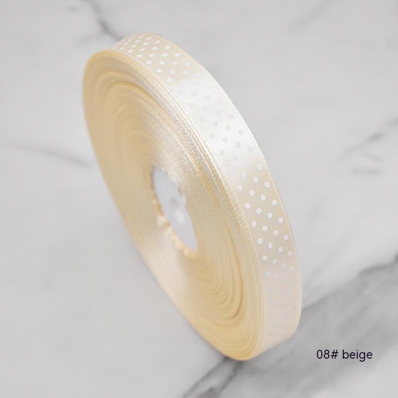 Handmade decorative bows featuring classic polka dot patterns on premium grosgrain ribbon for gift wrapping and accessories
