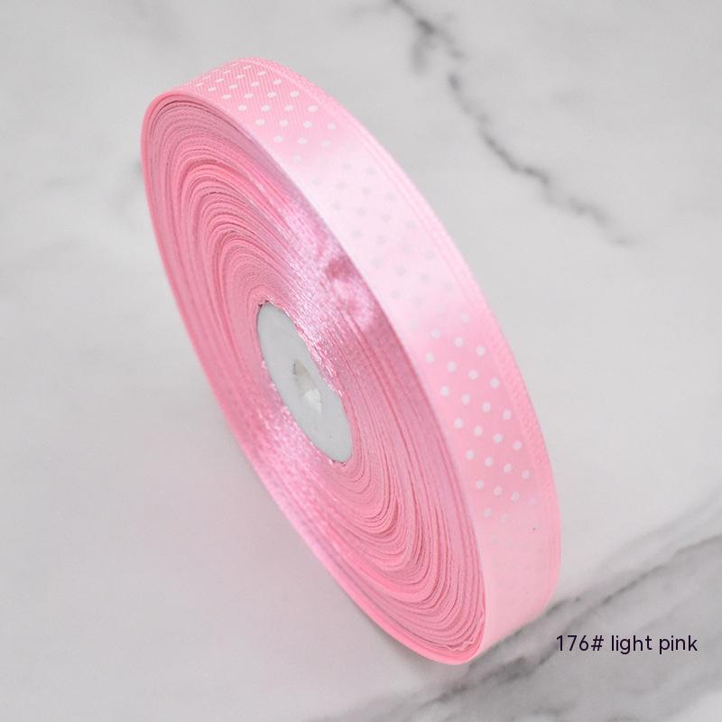 Handmade decorative bows featuring classic polka dot patterns on premium grosgrain ribbon for gift wrapping and accessories