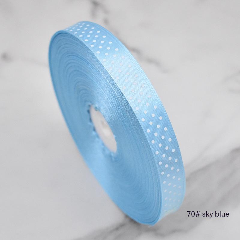 Handmade decorative bows featuring classic polka dot patterns on premium grosgrain ribbon for gift wrapping and accessories
