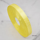 Handmade decorative bows featuring classic polka dot patterns on premium grosgrain ribbon for gift wrapping and accessories