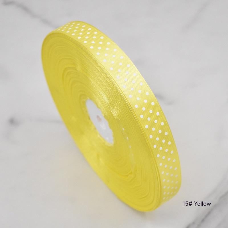 Handmade decorative bows featuring classic polka dot patterns on premium grosgrain ribbon for gift wrapping and accessories
