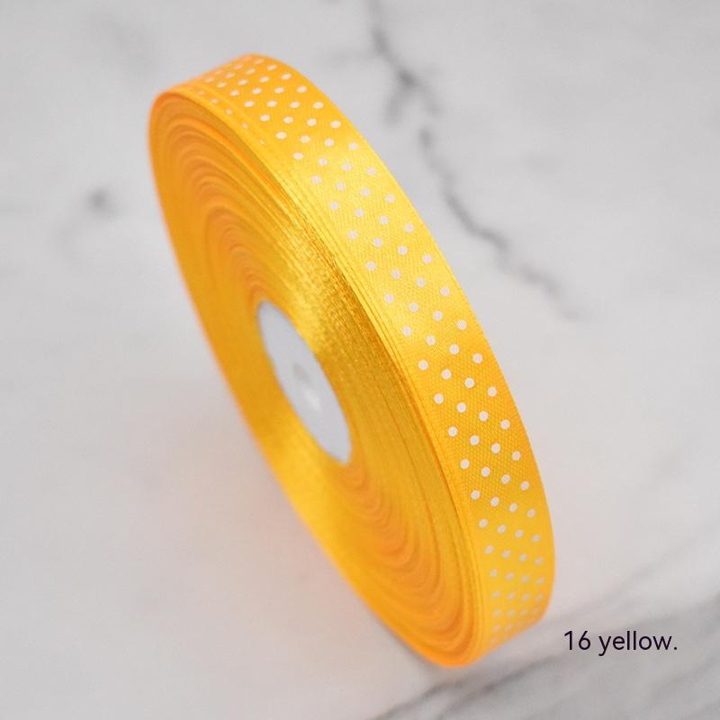 Handmade decorative bows featuring classic polka dot patterns on premium grosgrain ribbon for gift wrapping and accessories 