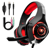 Gaming headset with red accents and additional cables on a white background