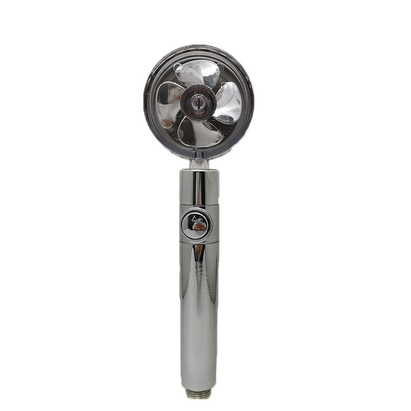 Chrome handheld shower head on a white background
