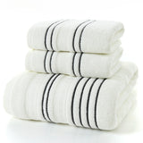 Set of white towels with black stripes on a white background