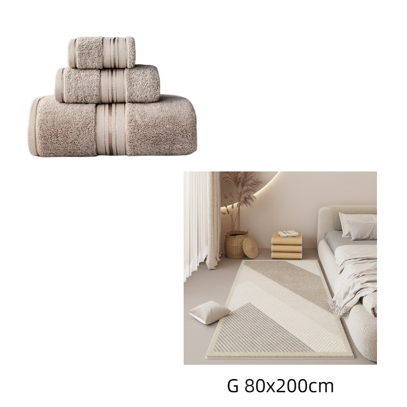 Beige towels with striped design on a white background, followed by a bedroom scene with a beige rug.