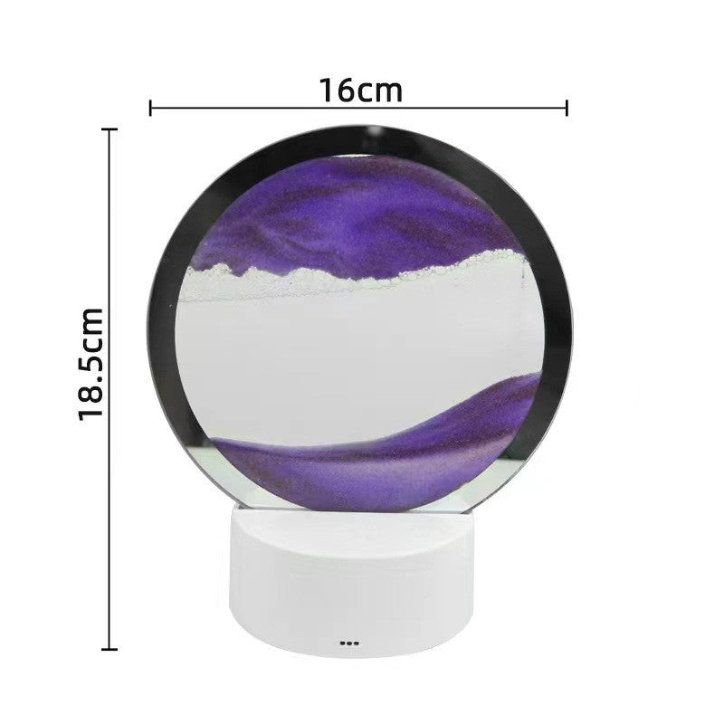 Glass orb with purple and white design on a white background, showing measurements.