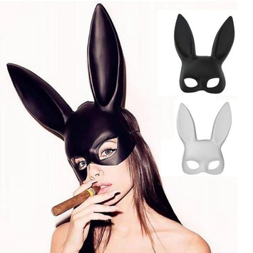 Black bunny mask worn by a person with additional masks displayed on a white background