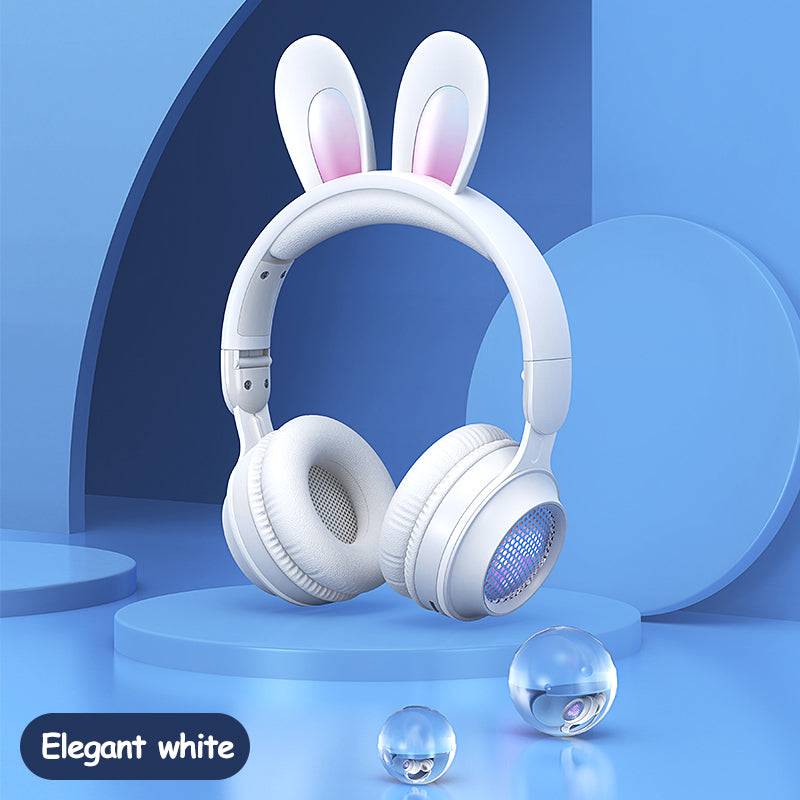 White headphones with bunny ears on a blue background