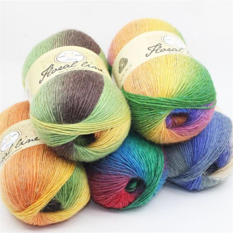Soft rainbow gradient ball of yarn with vibrant multi-color transitions for knitting, crochet, and DIY fiber arts