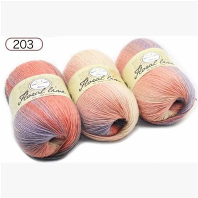 Three skeins of yarn with 'flower line' labels on a white background
