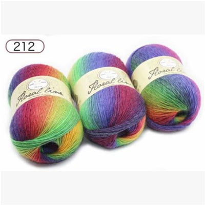 Three colorful skeins of yarn with 'Fresal Line' labels on a white background.