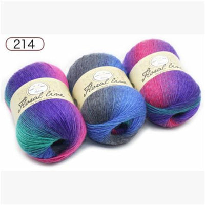 Three skeins of colorful yarn with labels on a white background