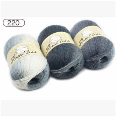 Three skeins of yarn with 'Floral Line' label on a white background