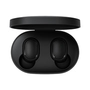 Black wireless earbuds in a charging case on a white background