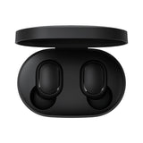 Black wireless earbuds in a charging case on a white background