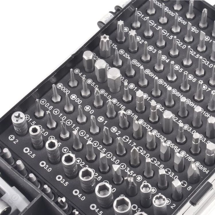 Set of screwdriver bits in a black case with white text