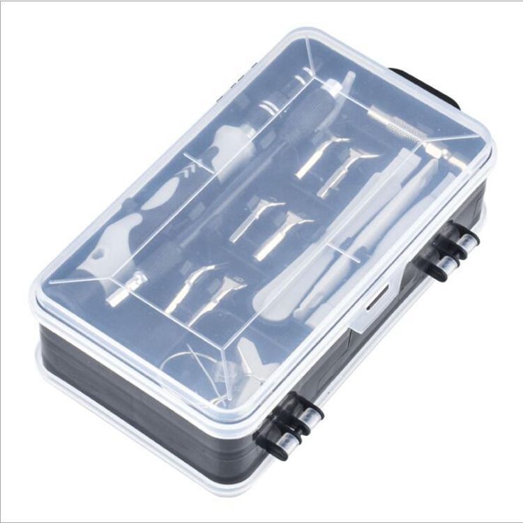Clear plastic fishing lure box with various fishing lures inside on a white background