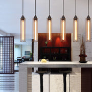 Modern interior with pendant lights hanging above a counter.
