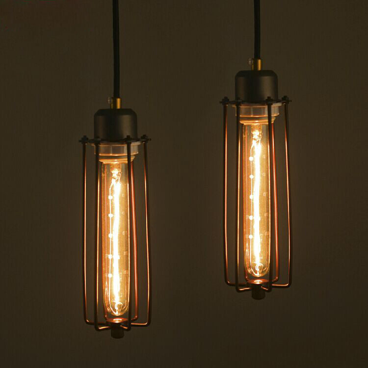 Two vintage-style light bulbs in wire cages on a dark background
