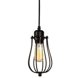 Black wire cage pendant light with a lit bulb on a white background