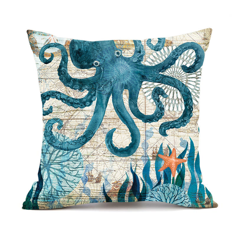 Decorative pillow with a blue octopus design on a map background