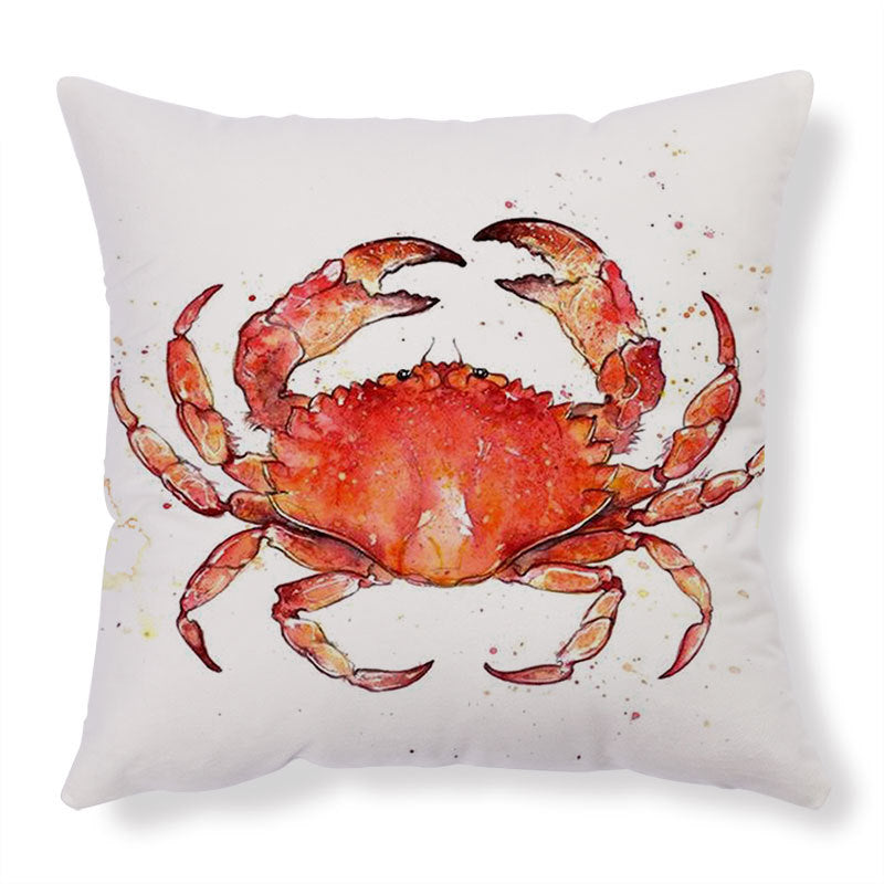 Pillow with a red crab design on a white background