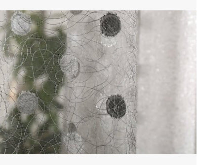 Abstract design with black and white patterns on a textured background