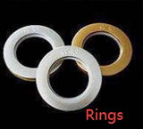 Three rings with different designs on a black background, labeled 'Rings'.