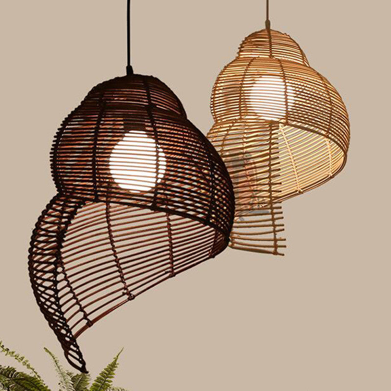 Two woven pendant lights on a beige background