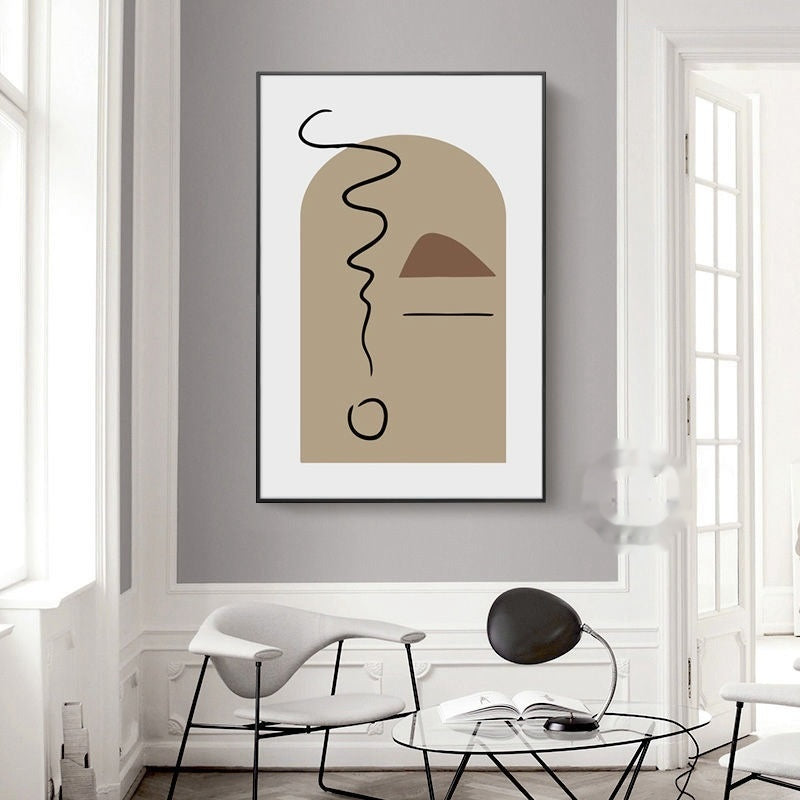Abstract art print on a gray wall in a modern living room