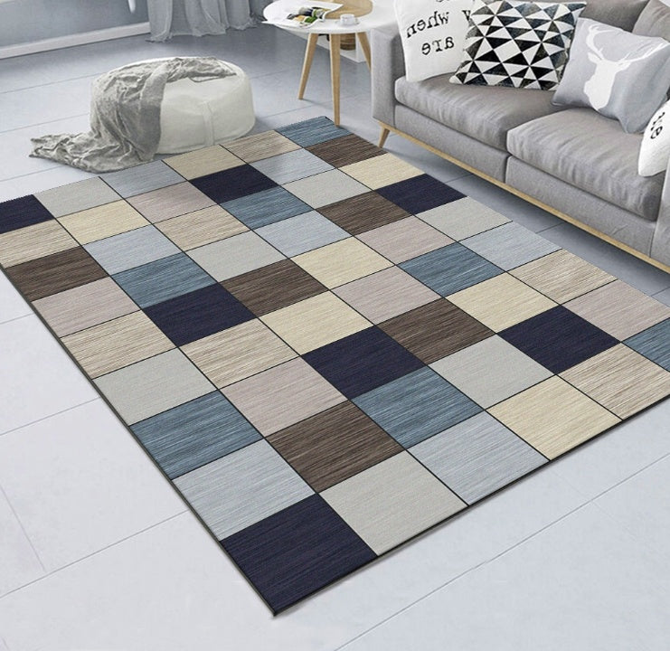 Checkered area rug in a living room setting with a sofa and cushions.