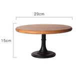 Round wooden table with dimensions labeled on a white background