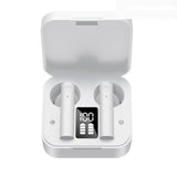 White wireless earbuds with charging case on a white background