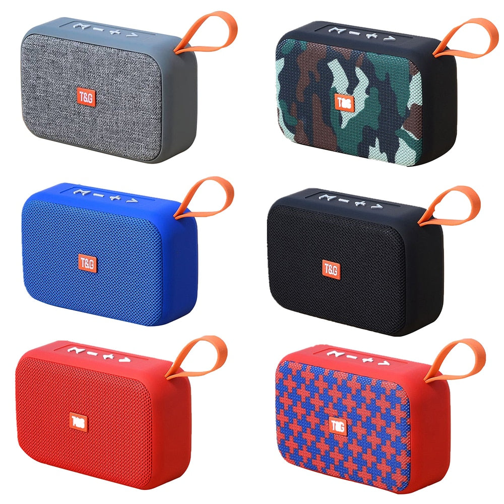 Six portable speakers in different colors and patterns on a white background