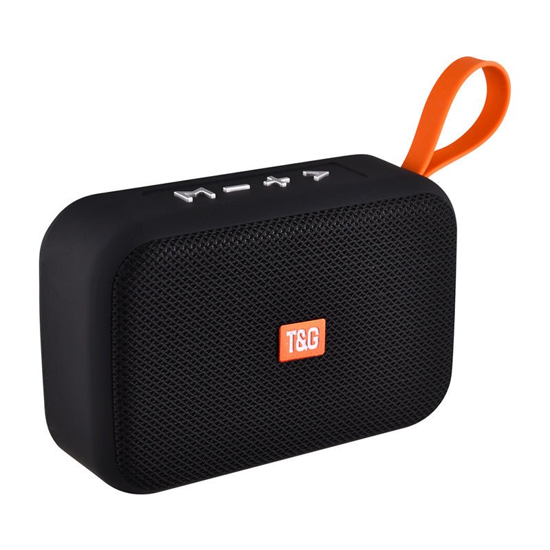 Black portable speaker with an orange handle and logo on a white background