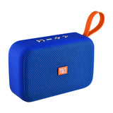 Blue portable speaker with an orange handle on a white background