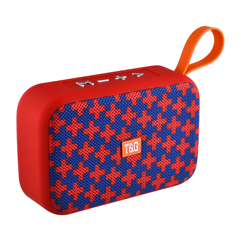 Red and blue patterned case with an orange handle on a white background
