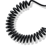 Coiled black cable on a white background