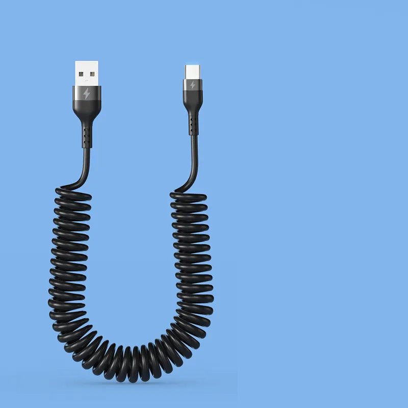 Coiled USB cable with one end being USB type A and the other end being USB type C on a blue background