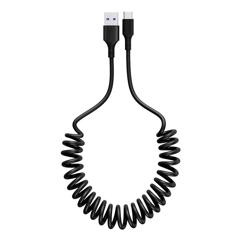 Coiled black USB cable on a white background