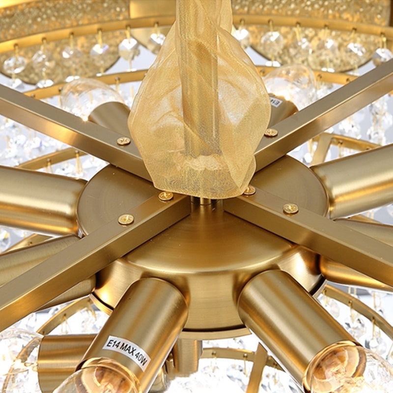 Close-up of a gold chandelier with crystal accents