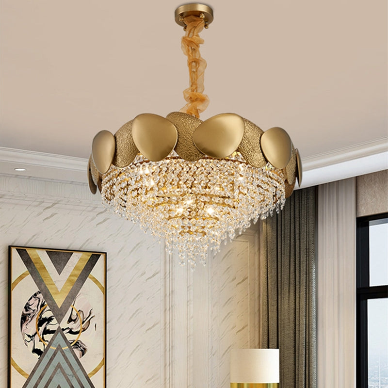 Gold chandelier with crystal accents in a room setting