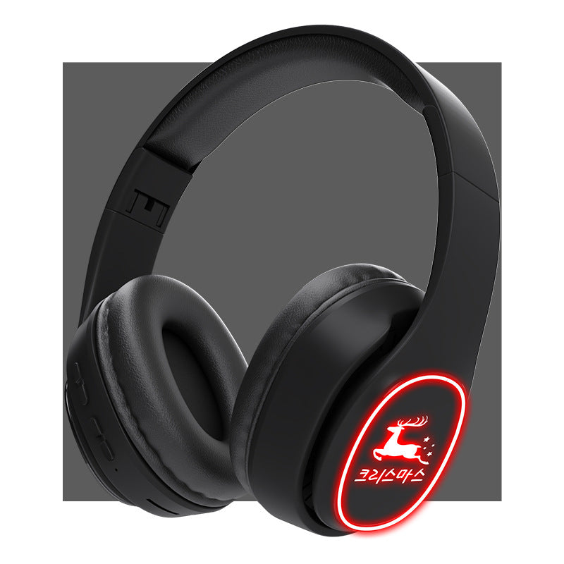 Black headphones with a red logo on a gray background