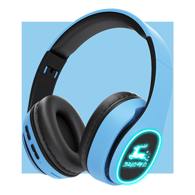 Black headphones with a blue accent on a light blue background