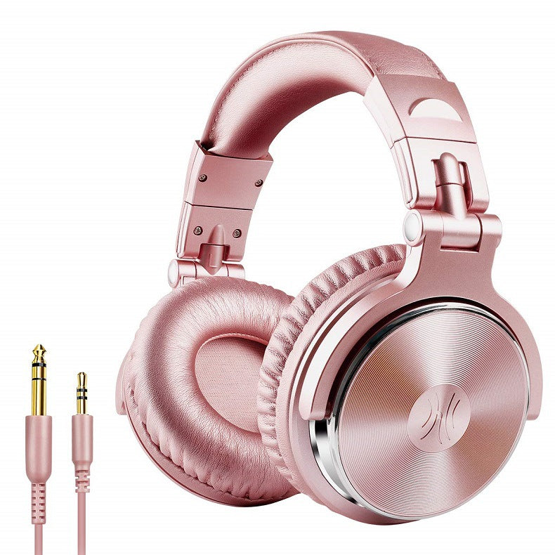 Rose gold headphones with a cable on a white background