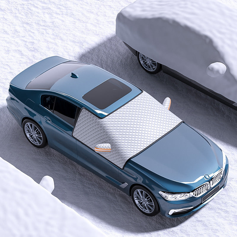 Blue car with a snow cover on a snowy surface