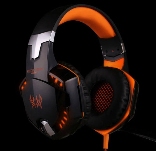 Black and orange gaming headset with visible branding on a black background