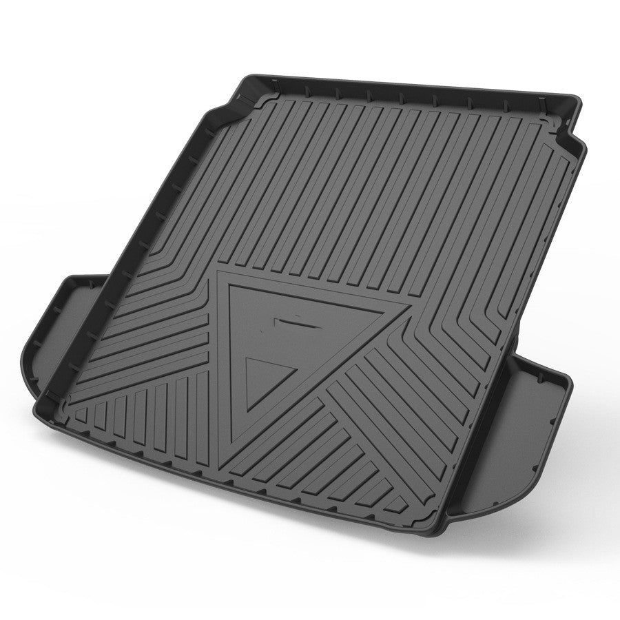 Durable black TPE car trunk mat with a sleek carbon fiber pattern and raised edges for spill protection