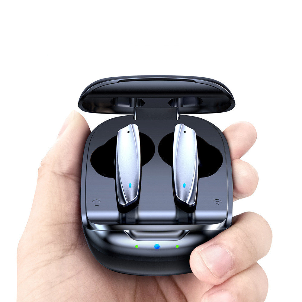 Black wireless earbuds in a charging case held by a hand on a white background